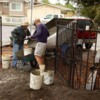 1: Unloading cement from a trailer.  I was raining this day.