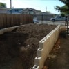 7: Concrete block wall looking west.